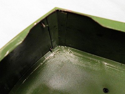 Gear cover corner relieved